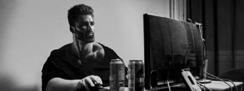 Photo of a man (chad) working at a computer